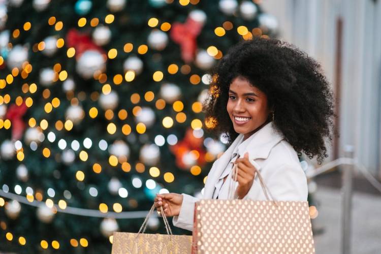 woman out shopping for Christmas presents