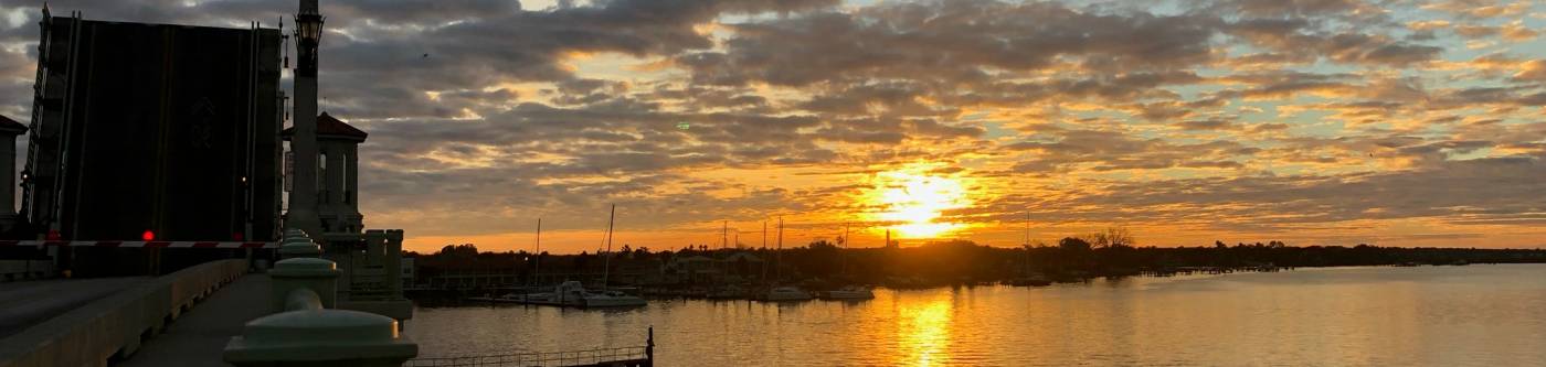 view of sunrise over atlantic ocean in st augustine florida with orange sky 