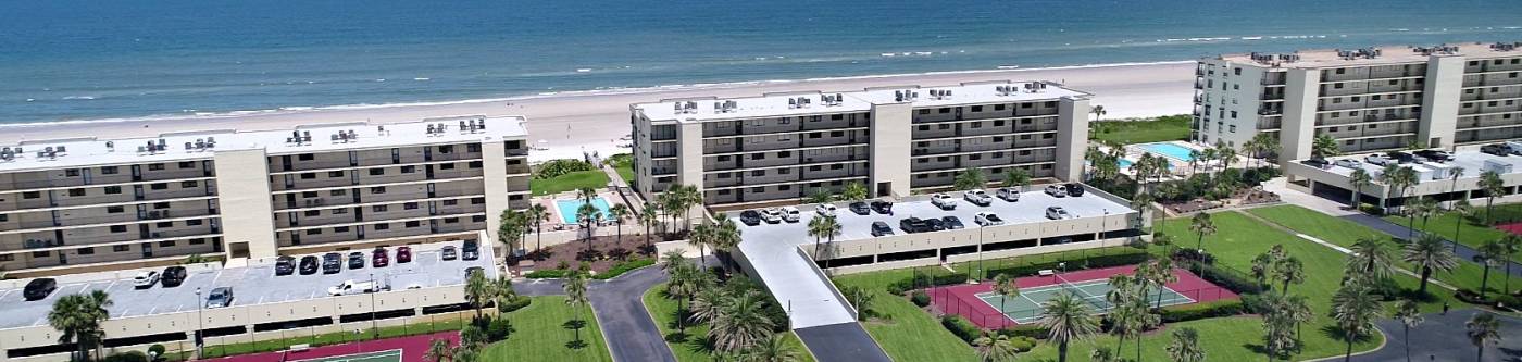 view of Sand Dollar condominiums from the aerial view with the atlantic ocean in the background