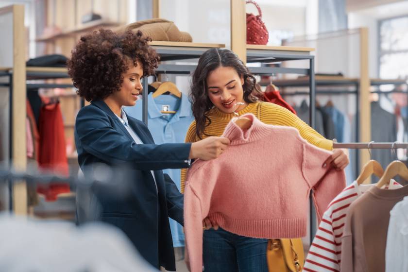 two women shopping for clothes