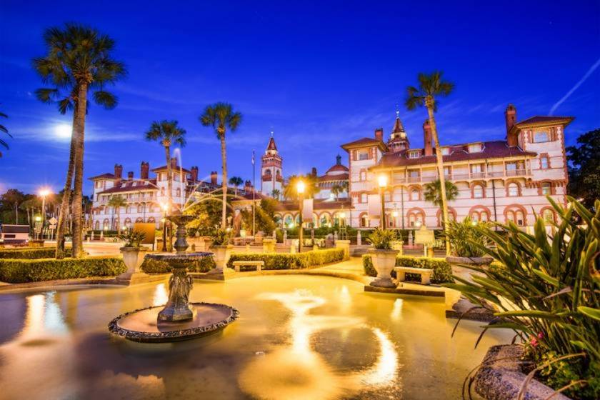 St. Augustine historical building with view of fountain and christmas lights