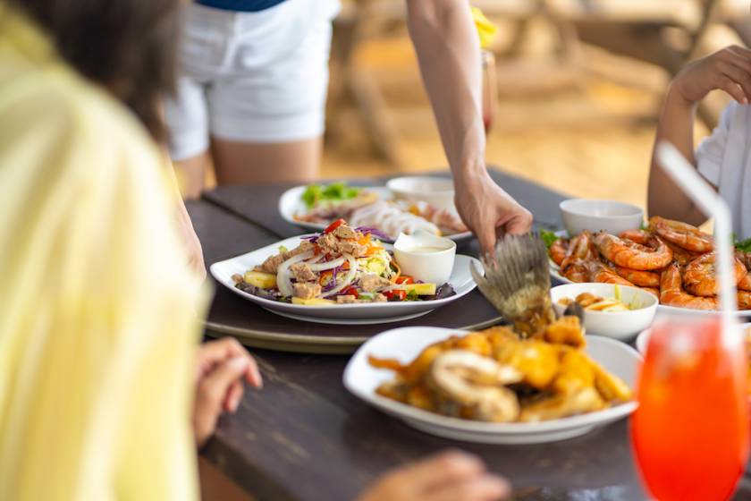 couple out to eat at beach restaurant