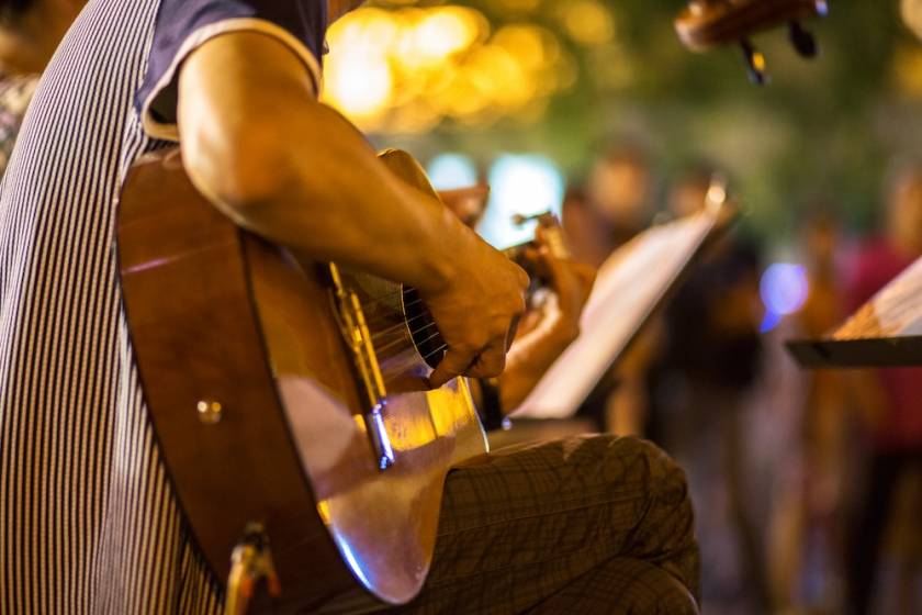 person playing guitar